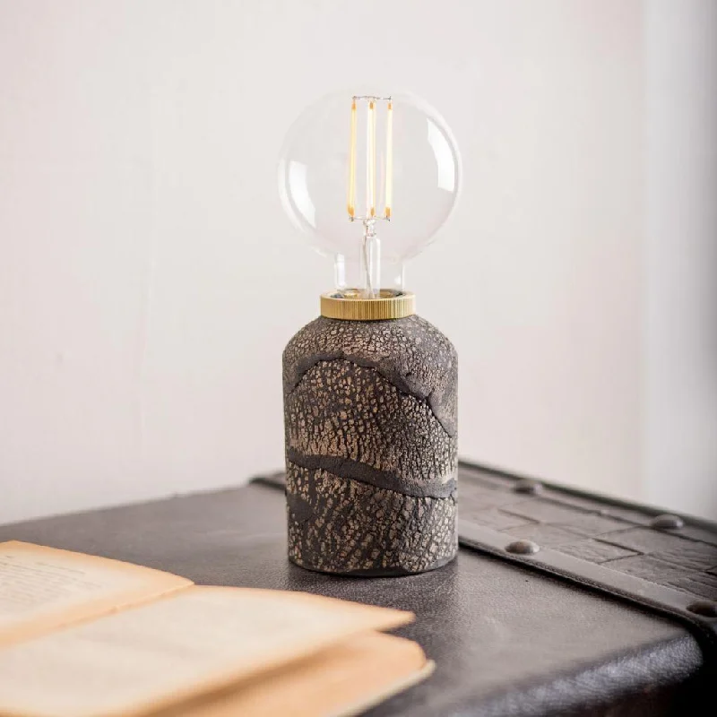 leather table lamps with a distressed texture for a rugged charmBixa Small Ceramic Table Lamp - Black Clay - Mullan Lighting leather table lamps with a distressed texture for a rugged charmBixa Small Ceramic Table Lamp - Black Clay - Mullan Lighting