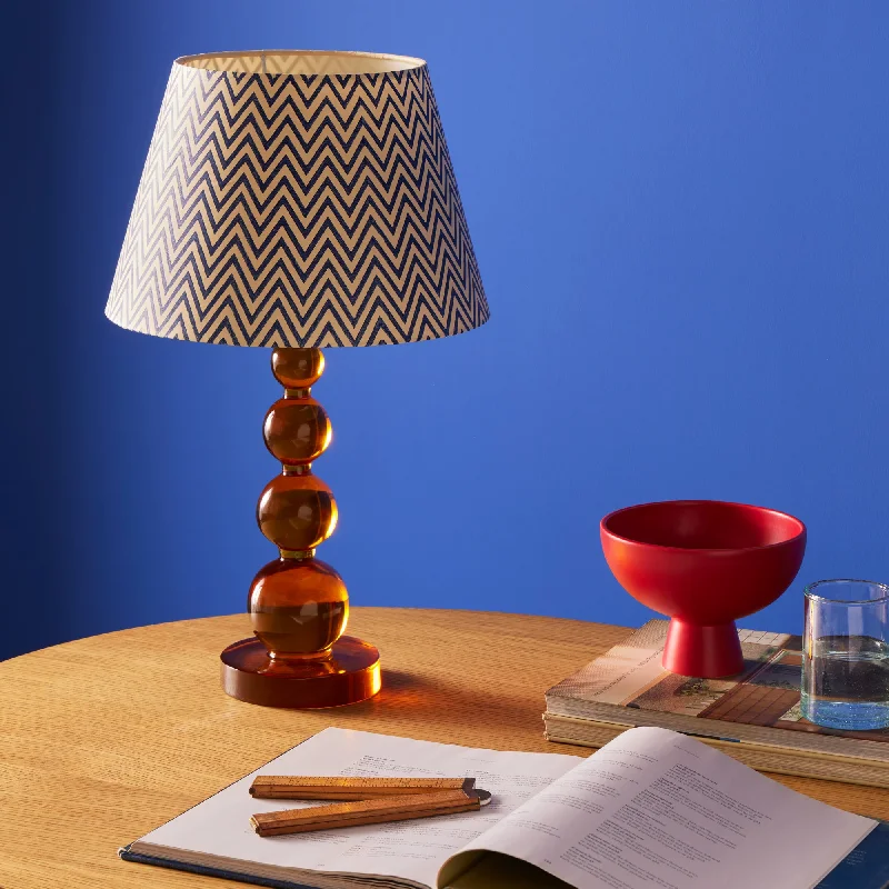 metal table lamps with a matte black finish for a sleek appearanceSmaller Aurora rechargeable table lamp in amber metal table lamps with a matte black finish for a sleek appearanceSmaller Aurora rechargeable table lamp in amber