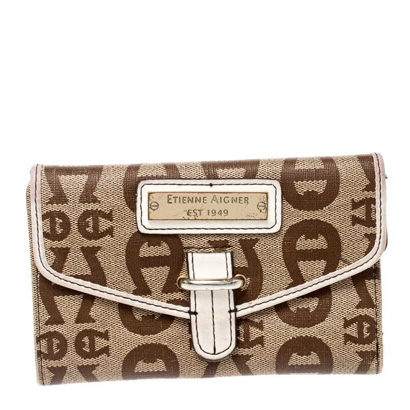 Top-rated money clips for everyday useAigner Beige Signature Coated Canvas Compact Wallet.. Top-rated money clips for everyday useAigner Beige Signature Coated Canvas Compact Wallet..