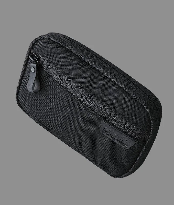 Travel bag with a detachable toiletry pouch for convenienceAlpaka Admin Pouch