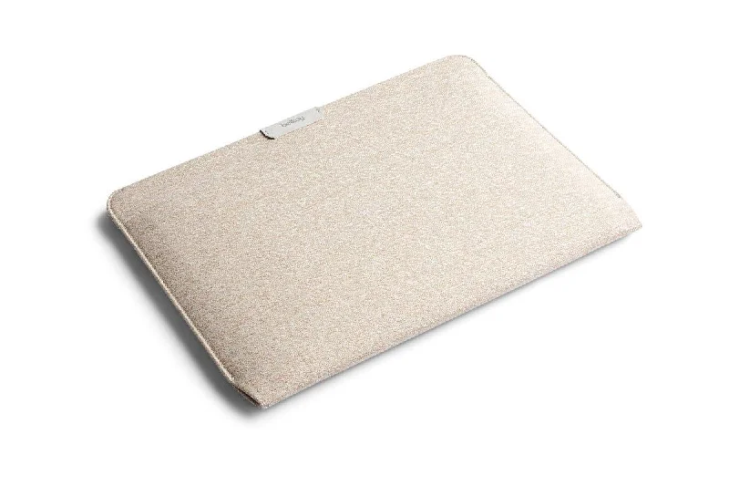 Vintage leather travel bag with brass accents for a classic and sophisticated lookBellroy Laptop Sleeve 16"