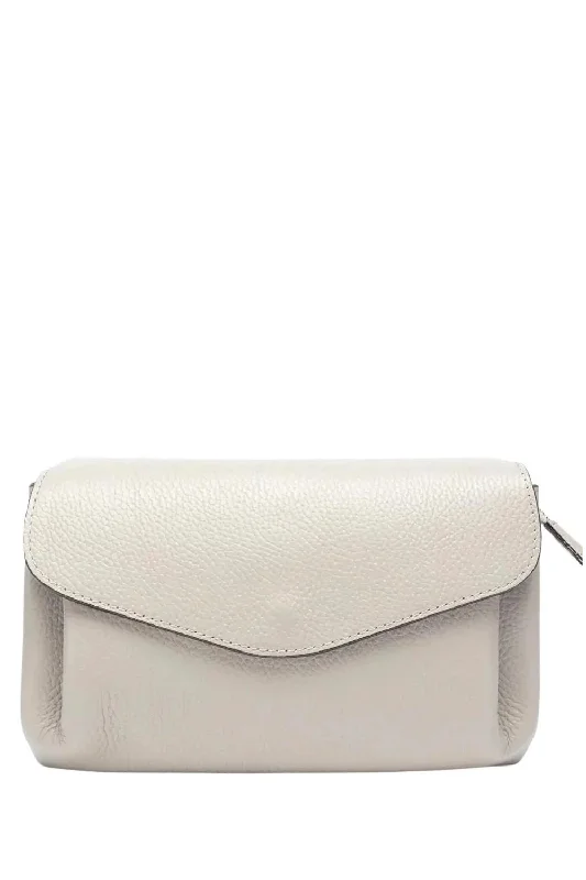 Men's leather crossbody bag with antique brass hardware for a vintage lookElie Beaumont Envelope Bag, Stone