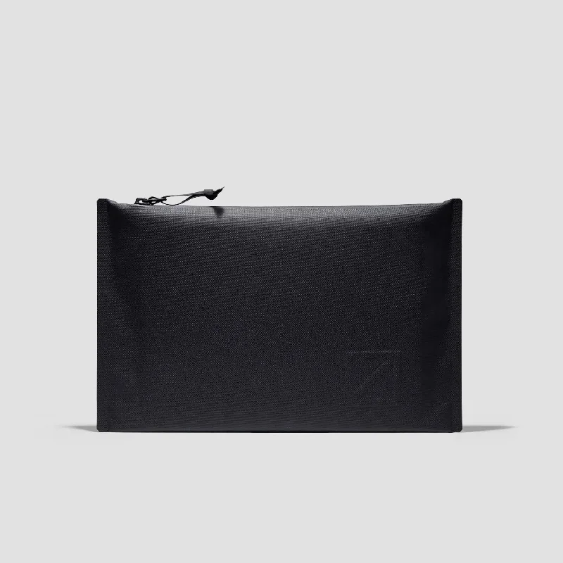 Foldable fabric travel bag for convenient storage when not in useEvergoods Element Drop In - Solution Dyed Black