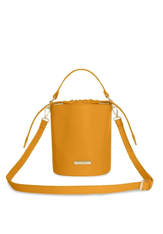 Vintage - inspired men's crossbody bag with a distressed finishKatie Loxton Amara Crossbody Bucket Bag, Ochre