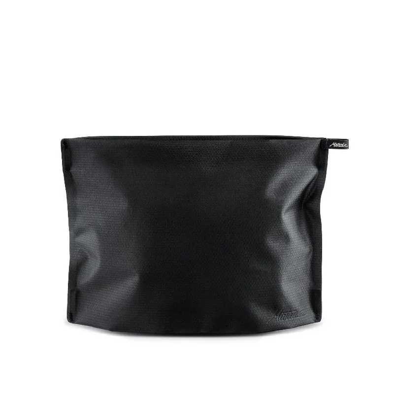 Travel bag with a retractable garment rack for easy unpackingMatador FlatPak Zipper Toiletry Case