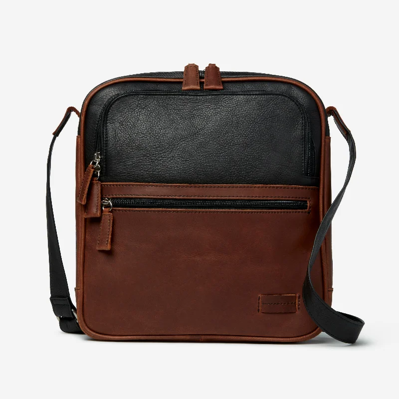 Military - style men's crossbody bag with MOLLE webbing for attachmentsOsgoode Marley Leather Unisex Calvin Crossbody Traveler Military - style men's crossbody bag with MOLLE webbing for attachmentsOsgoode Marley Leather Unisex Calvin Crossbody Traveler