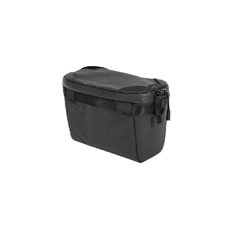 Smart travel bag with integrated GPS tracker for lost item recoveryPeak Design Camera Cube V2