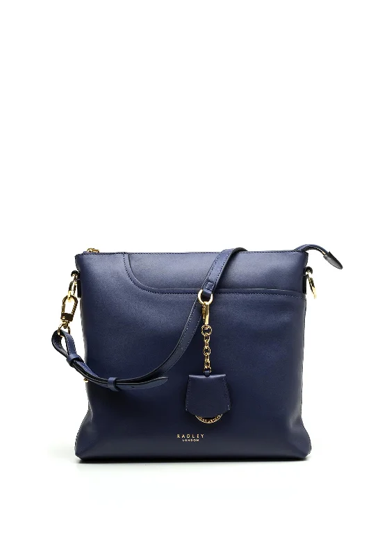 Minimalist men's crossbody bag with a single compartment for simplicityRadley Pockets 2.0 Medium Crossbody, Blue Minimalist men's crossbody bag with a single compartment for simplicityRadley Pockets 2.0 Medium Crossbody, Blue