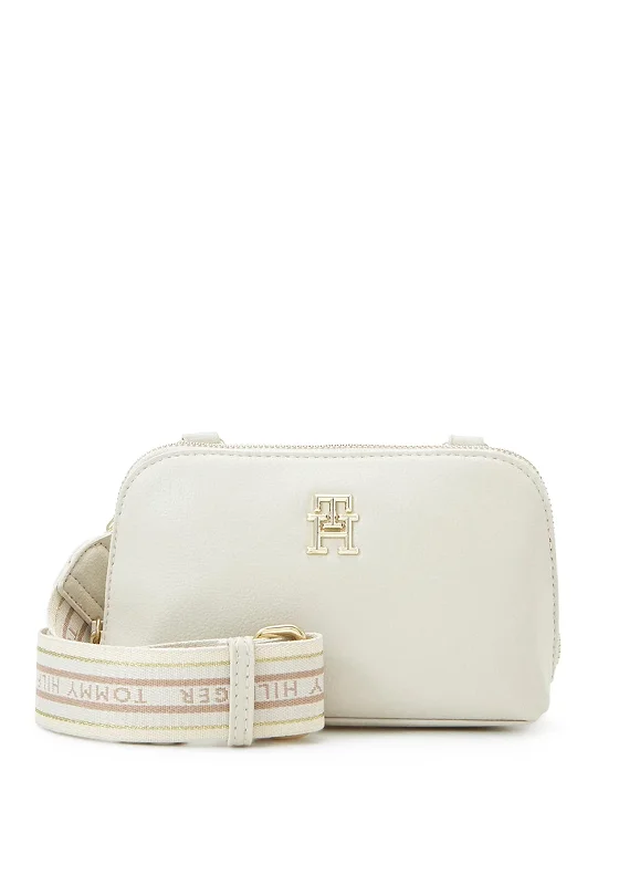 Minimalist men's crossbody bag with a single compartment for simplicityTommy Hilfiger Webbing Strap Mini Crossover Bag, Feather White Minimalist men's crossbody bag with a single compartment for simplicityTommy Hilfiger Webbing Strap Mini Crossover Bag, Feather White