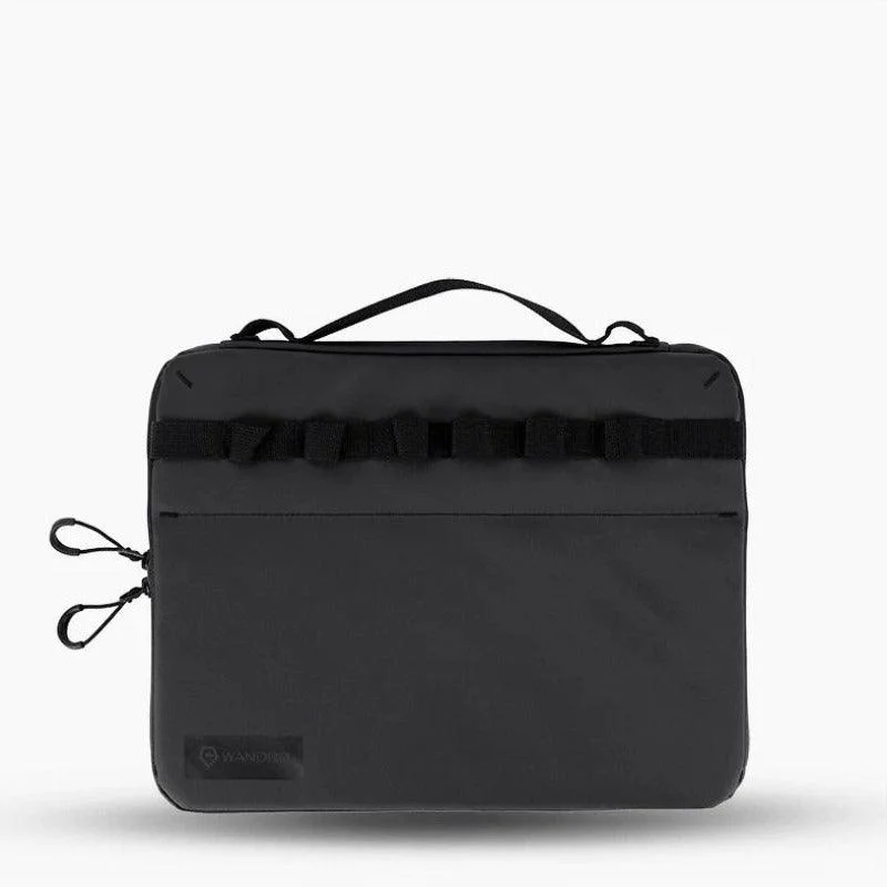 Expandable hard - shell polycarbonate travel bag for long - term international tripsWandrd Laptop Case Expandable hard - shell polycarbonate travel bag for long - term international tripsWandrd Laptop Case