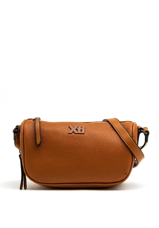 Men's leather crossbody bag with antique brass hardware for a vintage lookXti Curved Crossbody Bag, Camel