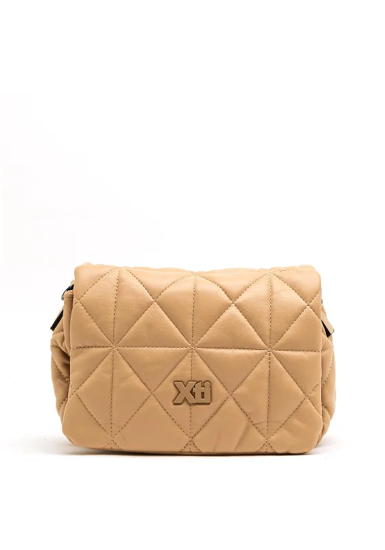 Men's crossbody bag with a built - in charging port for tech use on the goXti Quilted Crossbody Bag, Beige